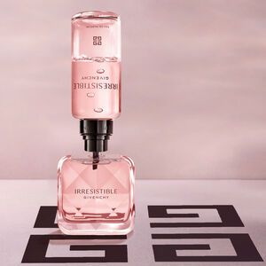 View 5 - IRRESISTIBLE REFILLABLE - An addictive fragrance of luscious rose dancing with radiant blond wood  in a refillable 100ml bottle. GIVENCHY - 100 ML - P000276